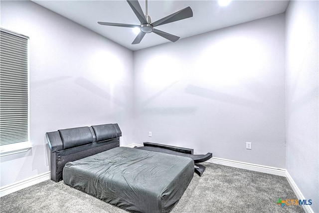 living area featuring ceiling fan and carpet floors