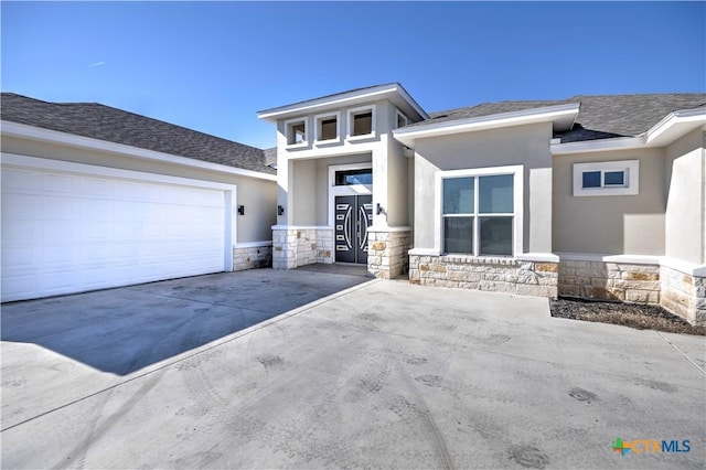 prairie-style home with a garage