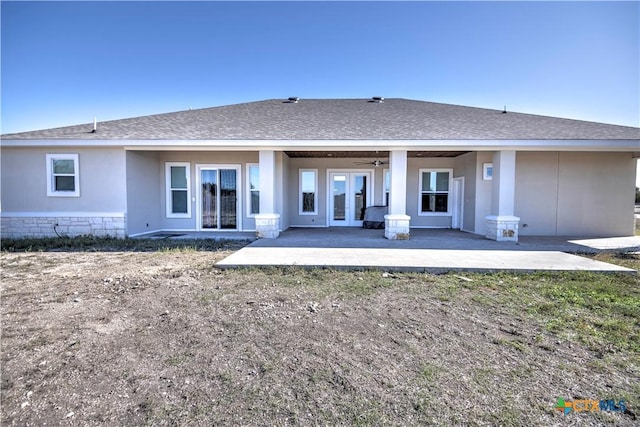 back of house with a patio area