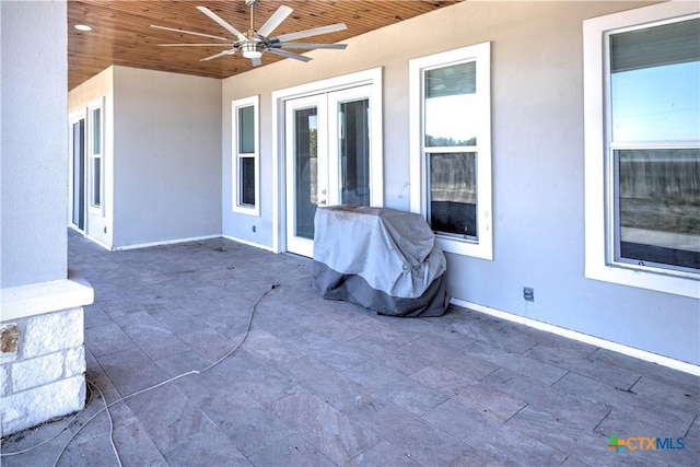 view of patio / terrace with a grill and ceiling fan