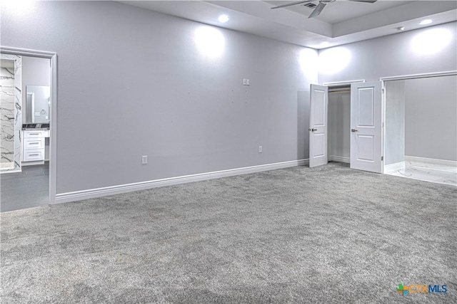 unfurnished bedroom with carpet and ceiling fan