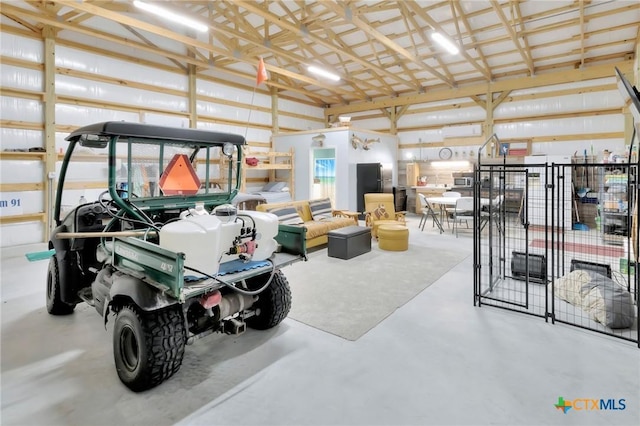 407 W Oakland Ave, Seadrift, TX 77983 - garage featuring freestanding refrigerator