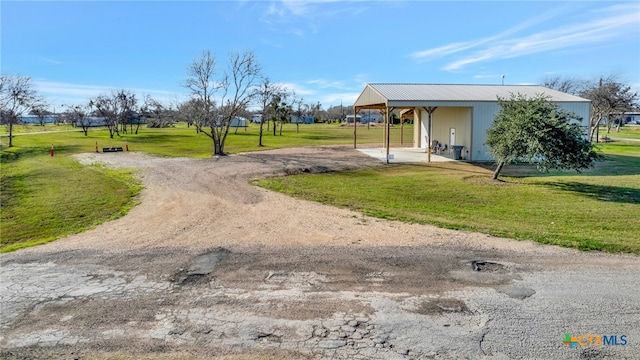 surrounding community featuring a yard