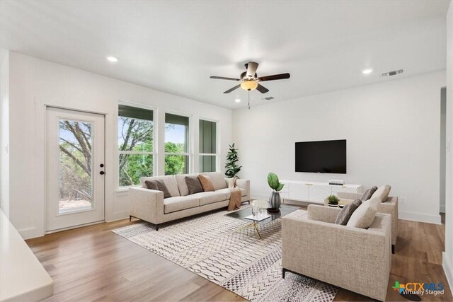 5116 Goliad Dr, Temple, TX 76502 - living area with wood finished floors, a ceiling fan, and recessed lighting