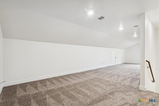 5116 Goliad Dr, Temple, TX 76502 - additional living space featuring carpet floors, vaulted ceiling, and baseboards