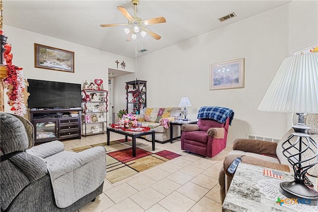 tiled living room with ceiling fan