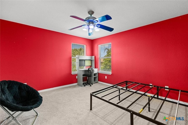 2123 Grizzly Trl, Harker Heights, TX 76548 - bedroom with carpet, a textured wall, and ceiling fan