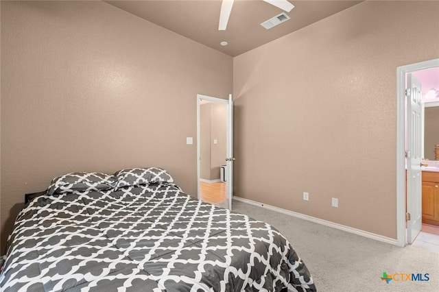 2123 Grizzly Trl, Harker Heights, TX 76548 - bedroom with light colored carpet, connected bathroom, and a ceiling fan