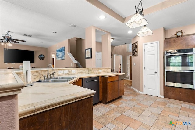 2123 Grizzly Trl, Harker Heights, TX 76548 - kitchen featuring appliances with stainless steel finishes, light countertops, ceiling fan, stone tile flooring, and recessed lighting