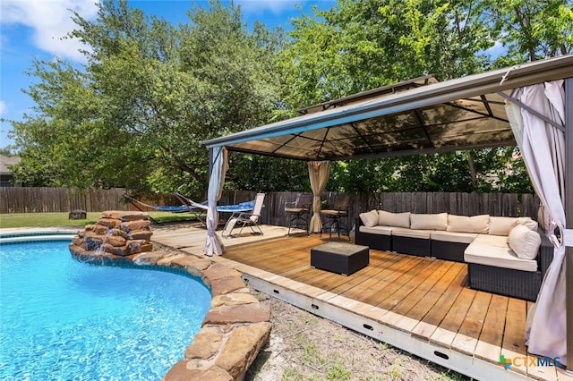 2123 Grizzly Trl, Harker Heights, TX 76548 - view of swimming pool with a gazebo, an outdoor hangout area, a wooden deck, and a fenced backyard