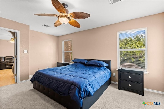 2123 Grizzly Trl, Harker Heights, TX 76548 - bedroom with light colored carpet and a ceiling fan