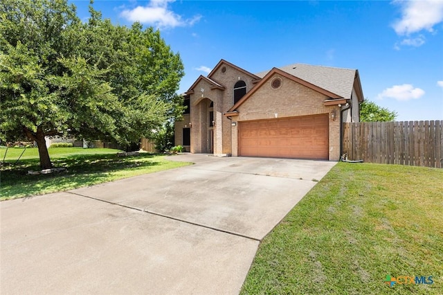 2123 Grizzly Trl, Harker Heights, TX 76548 - view of front facade featuring brick siding, driveway, and a garage