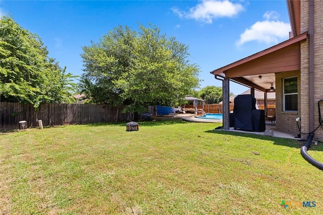 2123 Grizzly Trl, Harker Heights, TX 76548 - fenced backyard with a gazebo