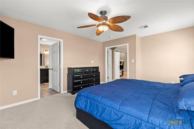 2123 Grizzly Trl, Harker Heights, TX 76548 - carpeted bedroom with a ceiling fan and ensuite bath