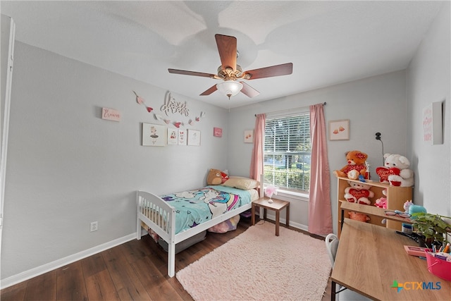 bedroom featuring ceiling fan and dark hardwood / wood-style floors