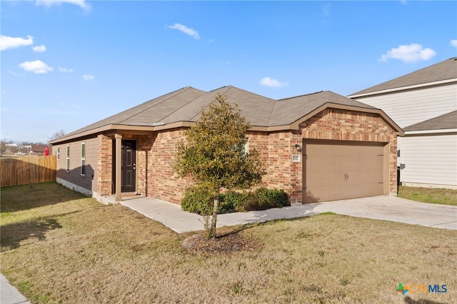 ranch-style home featuring a front yard and a garage