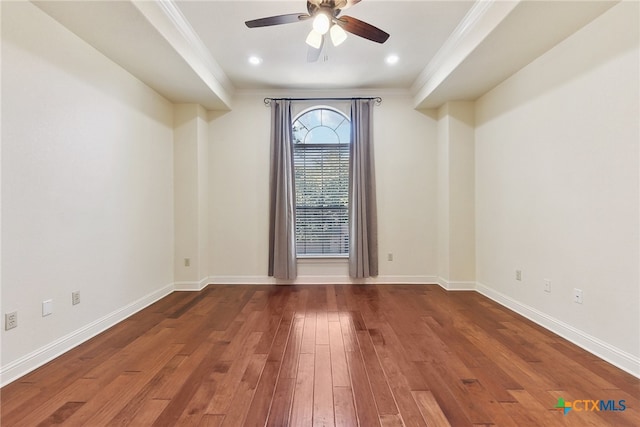 spare room featuring crown molding, ceiling fan, and wood-type flooring