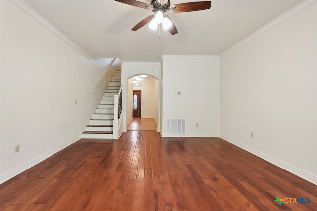 unfurnished living room featuring ornamental molding, ceiling fan, and dark wood-type flooring