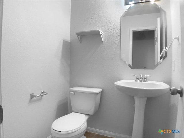 6502 Griffith Loop, Killeen, TX 76549 - half bath featuring toilet and baseboards