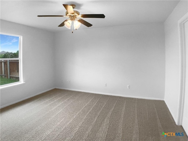 6502 Griffith Loop, Killeen, TX 76549 - unfurnished room with carpet floors, baseboards, and a ceiling fan