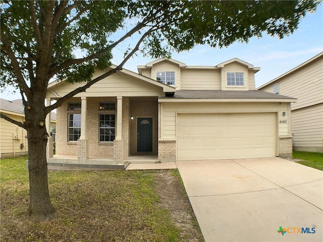 6502 Griffith Loop, Killeen, TX 76549 - view of front of property with covered porch, brick siding, and concrete driveway