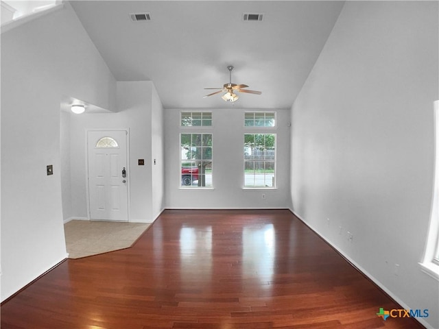 6502 Griffith Loop, Killeen, TX 76549 - foyer with a ceiling fan, visible vents, vaulted ceiling, wood finished floors, and baseboards