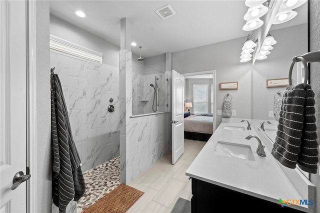 27522 Paraiso Sands, Boerne, TX 78015 - full bath with plenty of natural light, double vanity, a marble finish shower, ensuite bath, and recessed lighting