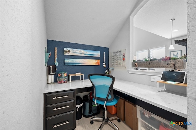 27522 Paraiso Sands, Boerne, TX 78015 - office area featuring built in study area, a textured wall, and lofted ceiling