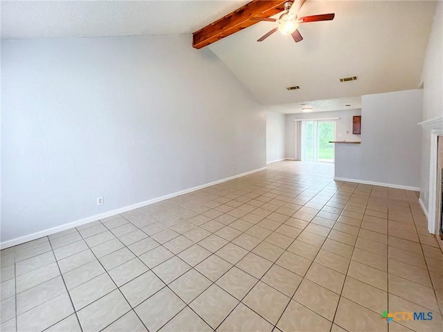 spare room featuring a ceiling fan, light tile patterned floors, baseboards, and a fireplace