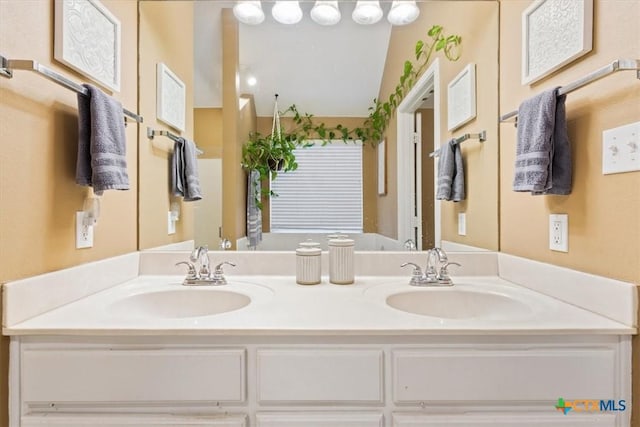 bathroom featuring vanity