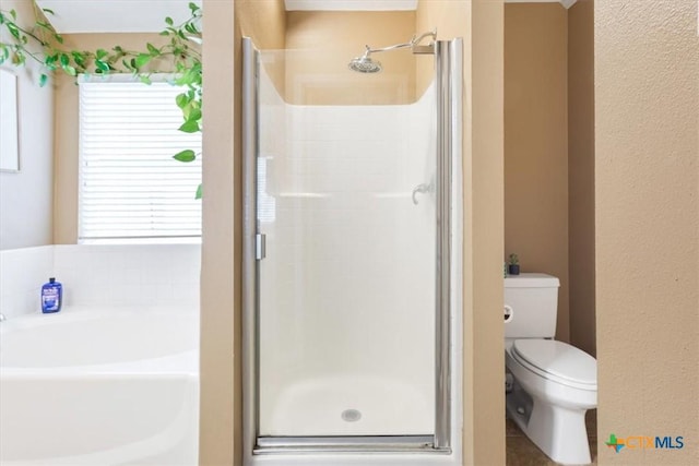 bathroom with plus walk in shower and toilet