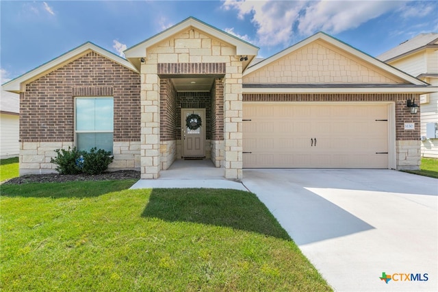 3130 Wigeon Way, Copperas Cove, TX 76522 - view of front of house featuring an attached garage, stone siding, driveway, a front yard, and brick siding