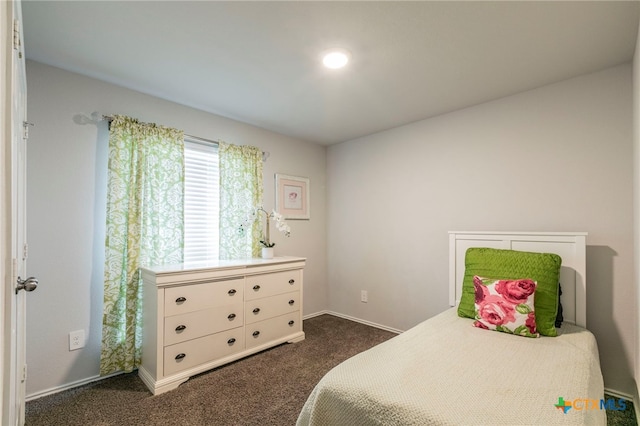 3130 Wigeon Way, Copperas Cove, TX 76522 - bedroom with dark colored carpet and baseboards