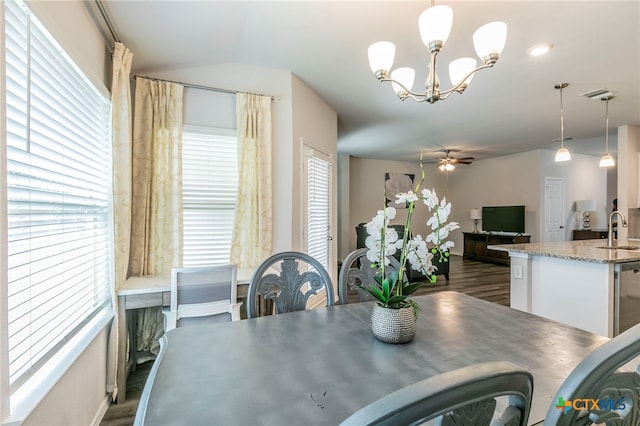 3130 Wigeon Way, Copperas Cove, TX 76522 - dining space with dark wood-style flooring, a chandelier, lofted ceiling, and ceiling fan