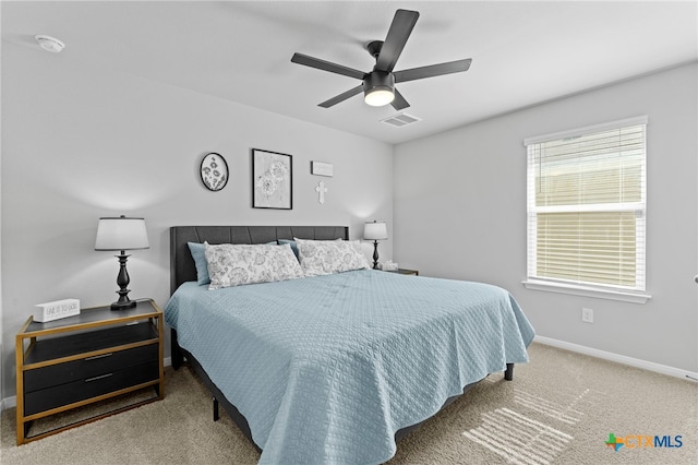 bedroom featuring ceiling fan and carpet flooring