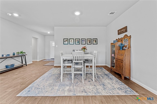 dining room featuring hardwood / wood-style floors