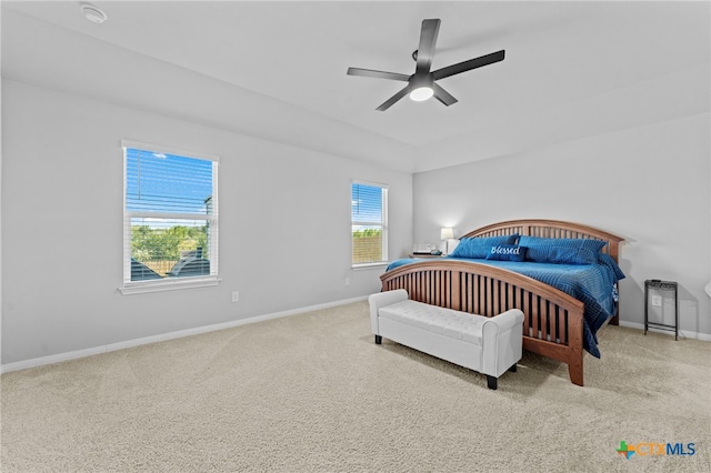 carpeted bedroom featuring ceiling fan