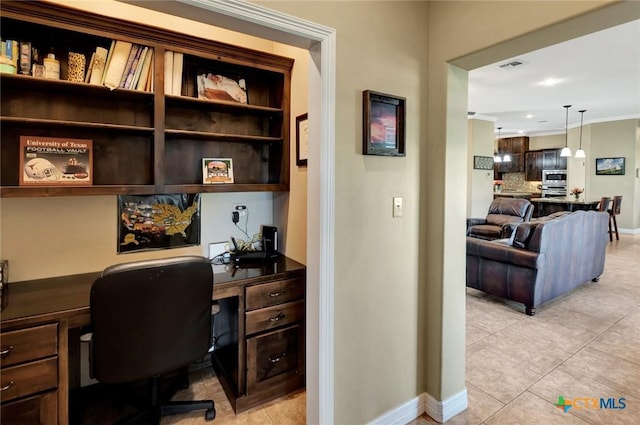 135 Wellspring Blvd, Victoria, TX 77904 - home office with baseboards, light tile patterned floors, and ornamental molding
