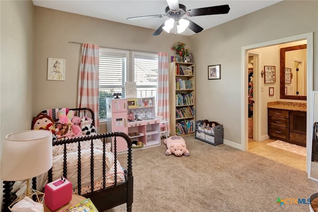 135 Wellspring Blvd, Victoria, TX 77904 - bedroom featuring light carpet, ensuite bathroom, and ceiling fan