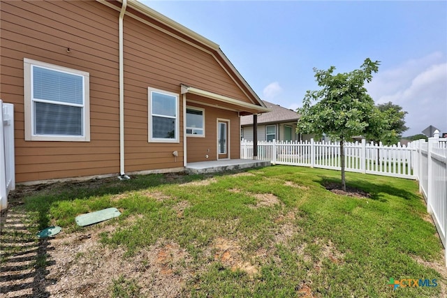 exterior space featuring a patio and a yard