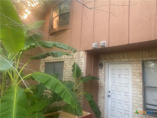 207 Palmwood Dr Unit 4, Victoria, TX 77901 - property entrance featuring brick siding