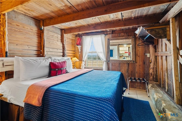 bedroom featuring wood walls, tile patterned flooring, beamed ceiling, and wood ceiling