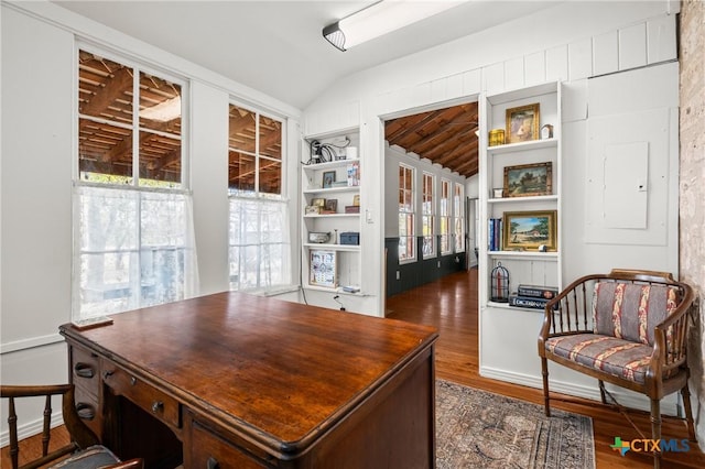 office area featuring dark hardwood / wood-style flooring and lofted ceiling