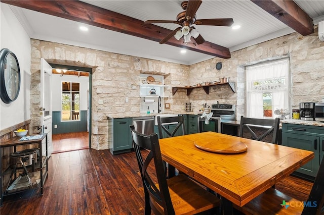 dining area with beamed ceiling, dark hardwood / wood-style flooring, ceiling fan, and sink