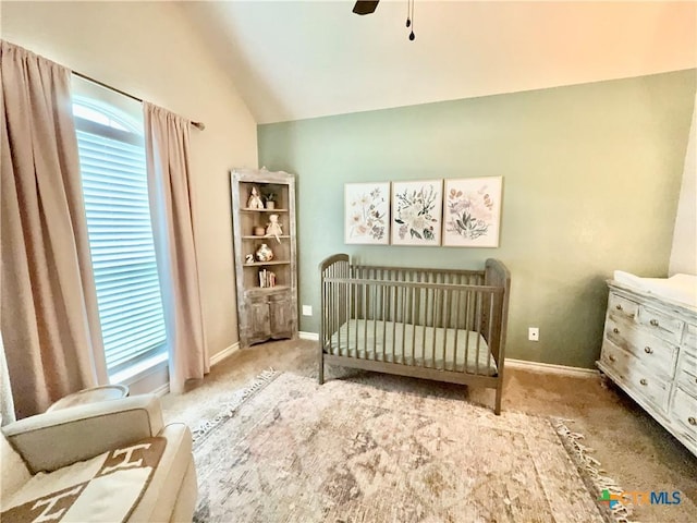 416 Coventry Dr, Temple, TX 76502 - carpeted bedroom featuring vaulted ceiling, a nursery area, baseboards, and ceiling fan