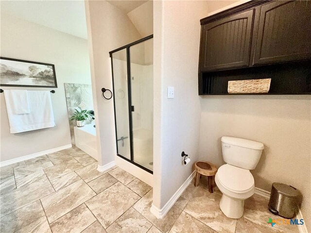 416 Coventry Dr, Temple, TX 76502 - bathroom with a stall shower, a bath, baseboards, and toilet