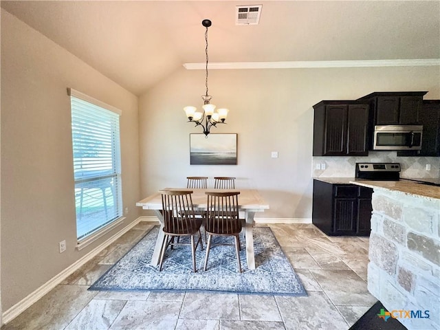 416 Coventry Dr, Temple, TX 76502 - dining area featuring a chandelier, baseboards, vaulted ceiling, and ornamental molding