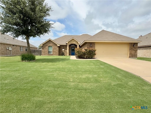 416 Coventry Dr, Temple, TX 76502 - single story home with a garage, brick siding, and driveway