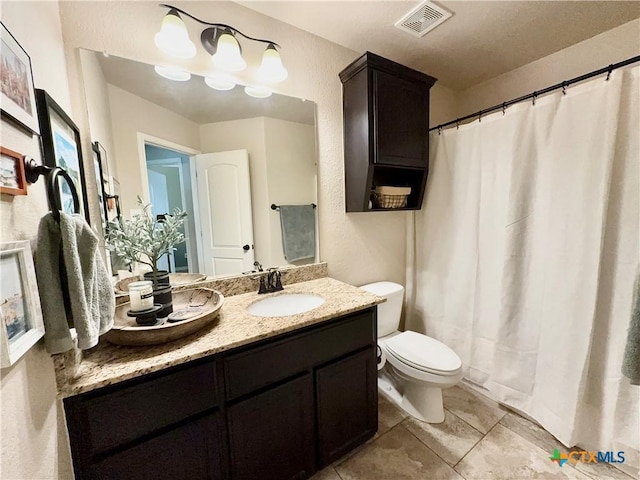416 Coventry Dr, Temple, TX 76502 - bathroom featuring vanity, toilet, tile patterned flooring, and curtained shower
