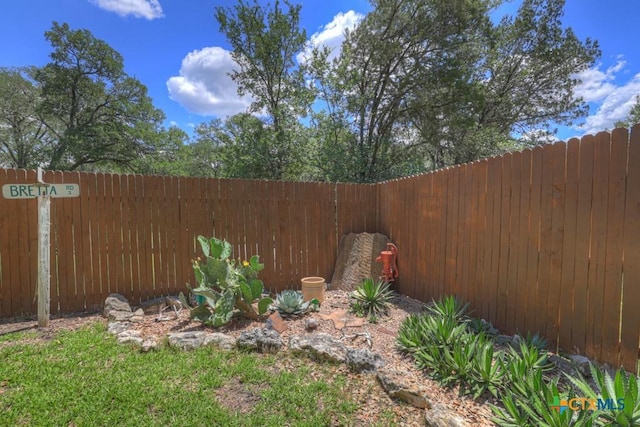 view of yard with fence